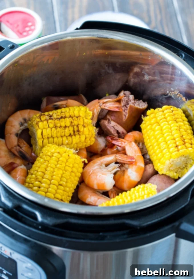Effortless Instant Pot Low Country Boil 4 Instant Pot Low Country Boil with tender potatoes, corn, sausage, and shrimp