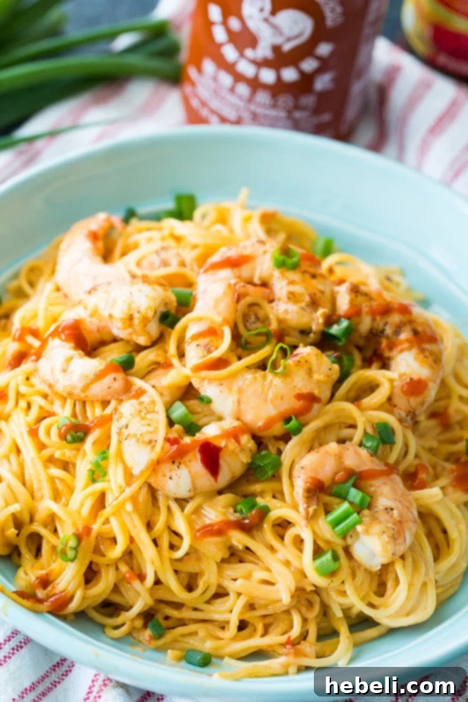 Delicious creamy Bang Bang Shrimp Pasta served in a bowl