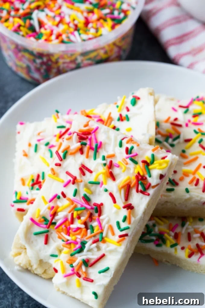 Delicious Sugar Cookie Bars with buttercream frosting, a perfect easy dessert recipe
