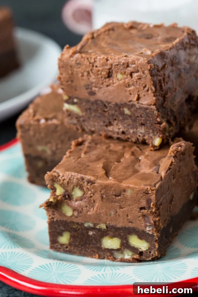 Decadent Fudge Topped Brownies with a thick layer of chocolate fudge