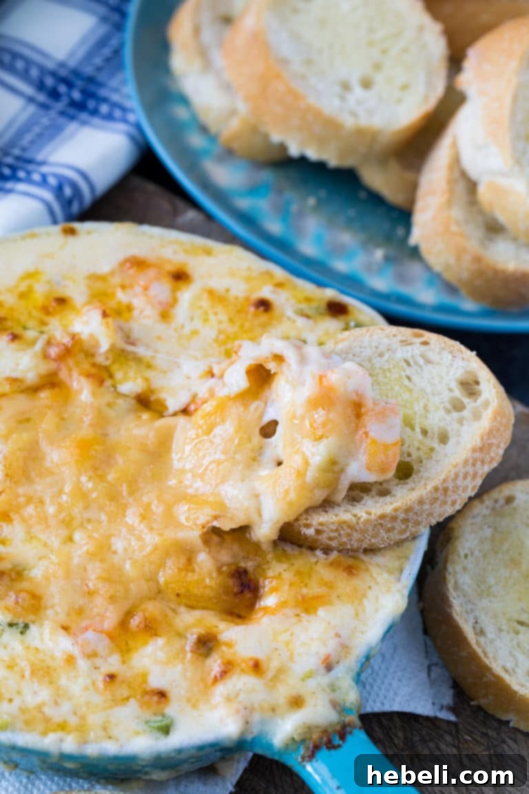 Close-up of Creamy Parmesan Shrimp Dip with golden crust
