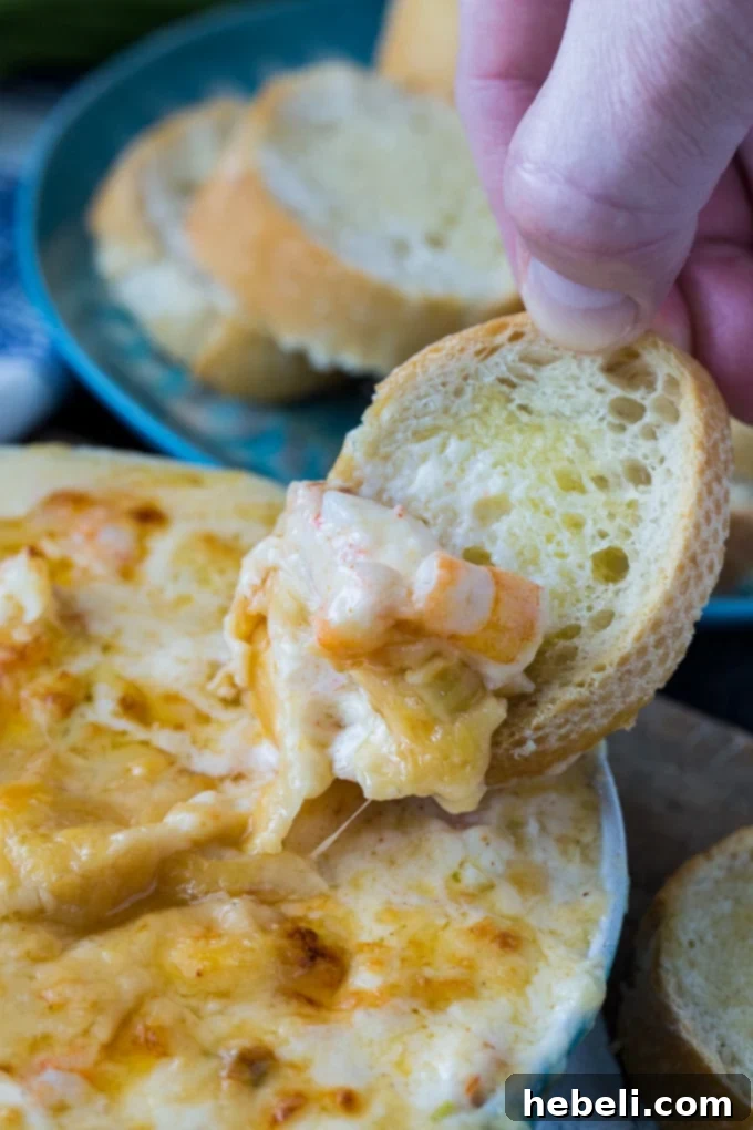 Serving Creamy Parmesan Shrimp Dip with toasted bread