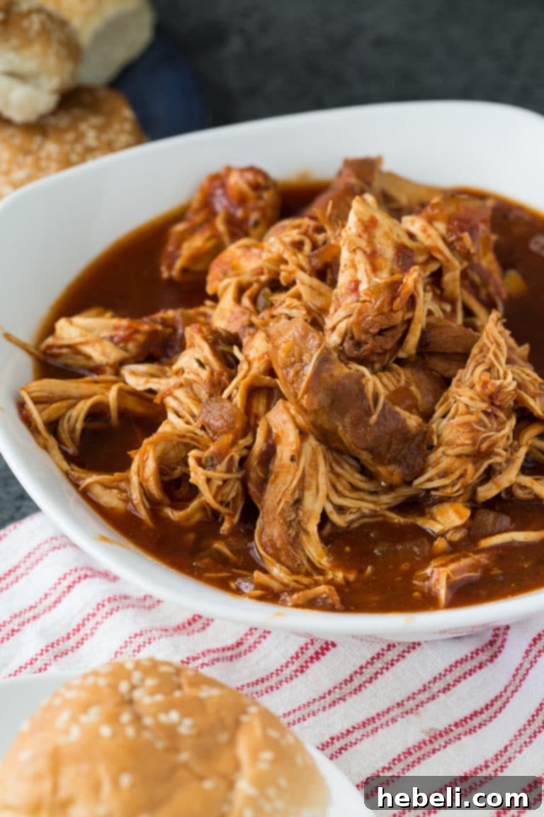 Smoky Slow Cooker Pulled Chicken 4 Crock Pot Chipotle Chicken recipe ingredients and shredded chicken.