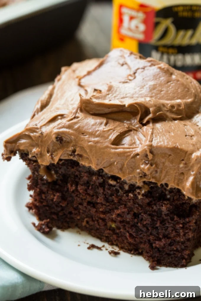 Velvet Chocolate Sheet Cake 4 A slice of Chocolate Mayonnaise Sheet Cake ready to be served