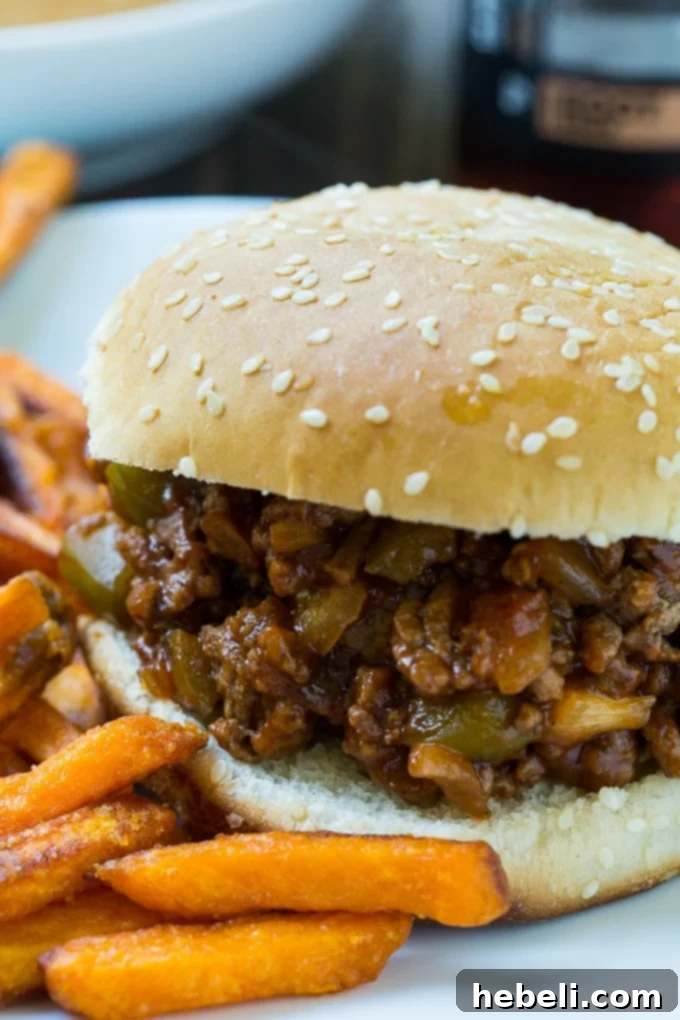 Root Beer Sloppy Joes served with a side of sweet potato fries