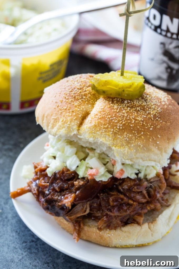 Root Beer Infused Pulled Pork 4 Close-up of shredded Crock Pot Root Beer Pulled Pork with BBQ sauce