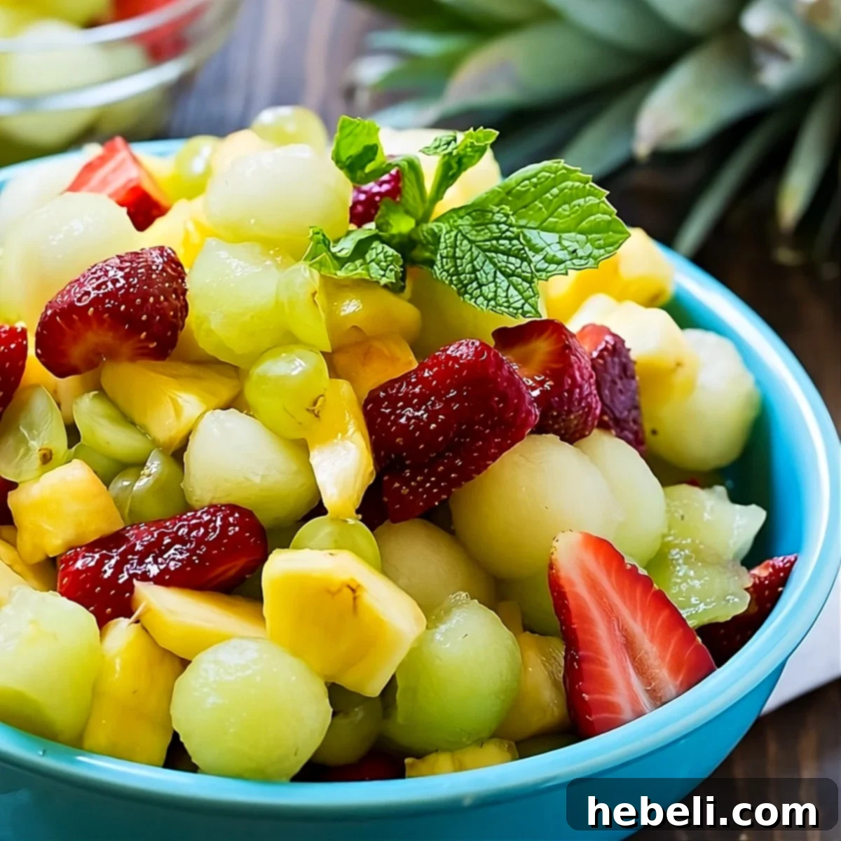 Amaretto Kissed Fruit Medley 2 Amaretto Fruit Salad in a serving bowl, showcasing colorful fruits