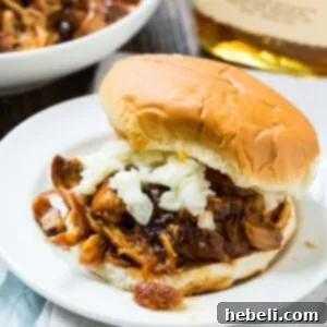 Crock Pot Bourbon Bacon Pulled Chicken in a serving bowl
