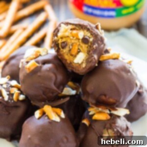 Delicious Peanut Butter Pretzel Truffles, showcasing their perfect round shape and chocolate coating, ready to be served.