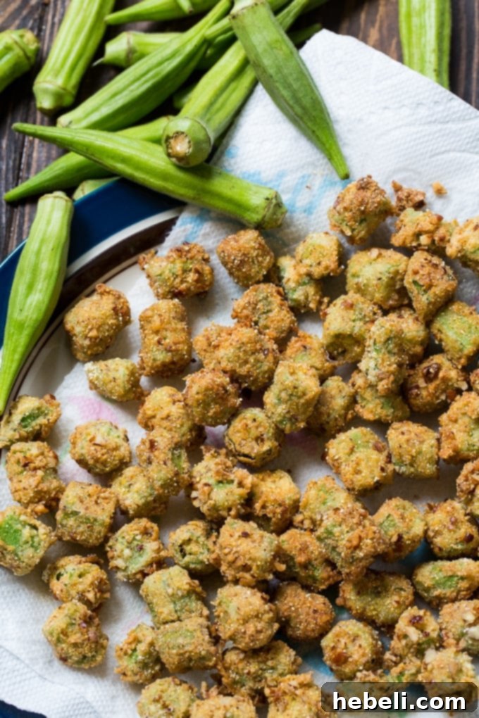 Close-up of crispy Pecan Crusted Fried Okra on a plate