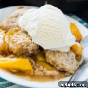 Skillet Bourbon Peach Cobbler with Cinnamon Sugar Dumplings