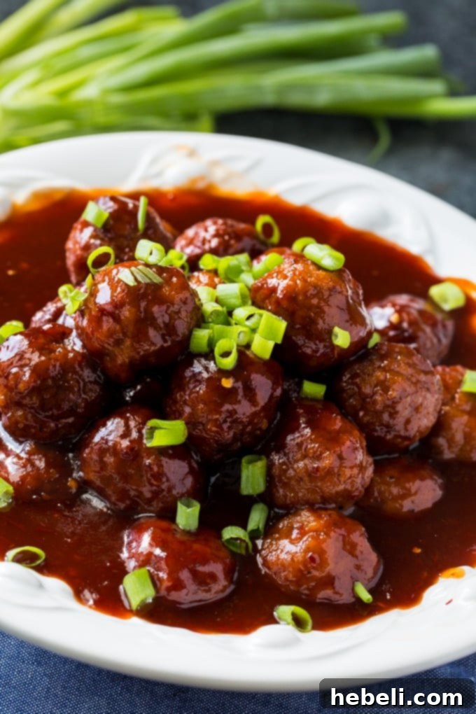 Close-up of Instant Pot Sweet and Spicy Meatballs in a serving dish, ready for a party.
