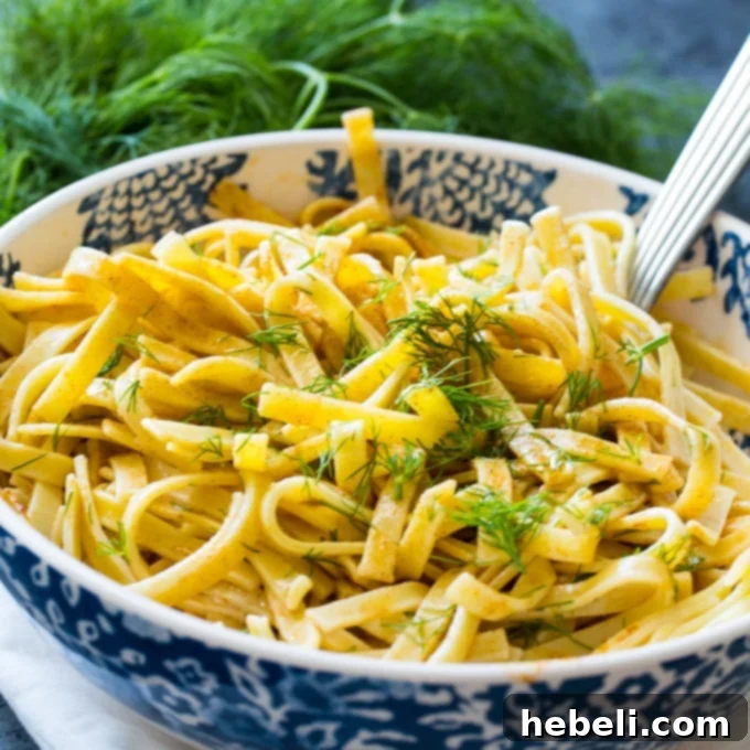 Dilled Egg Noodles served in a rustic bowl