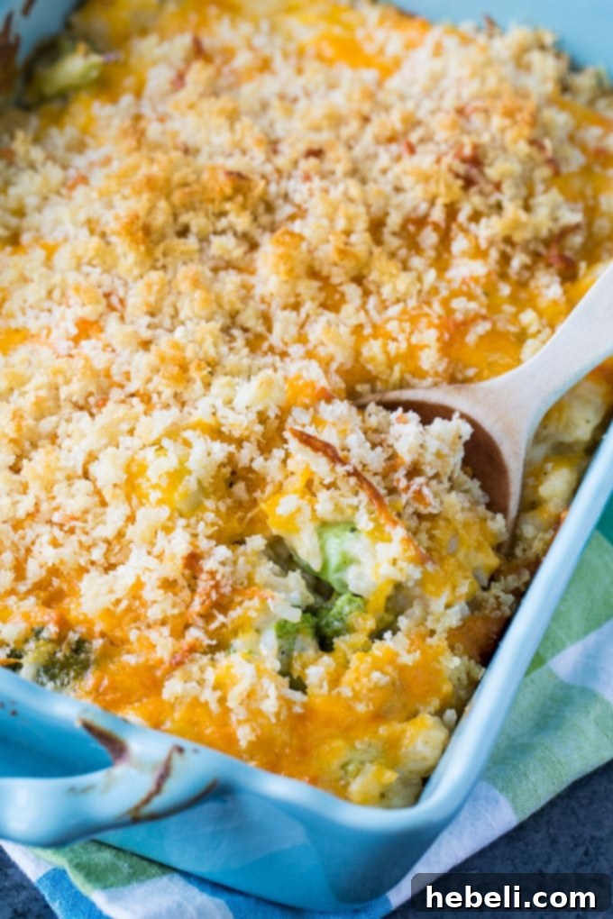 Ultimate Cheesy Broccoli and Rice Casserole 3 Close-up of the rich, creamy texture of Cheesy Broccoli and Rice Casserole, showcasing fresh broccoli florets and melted cheddar.