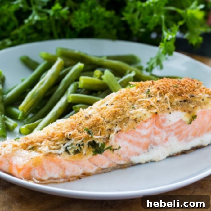 Baked Parmesan Salmon, cooked to golden perfection with a crispy crust.