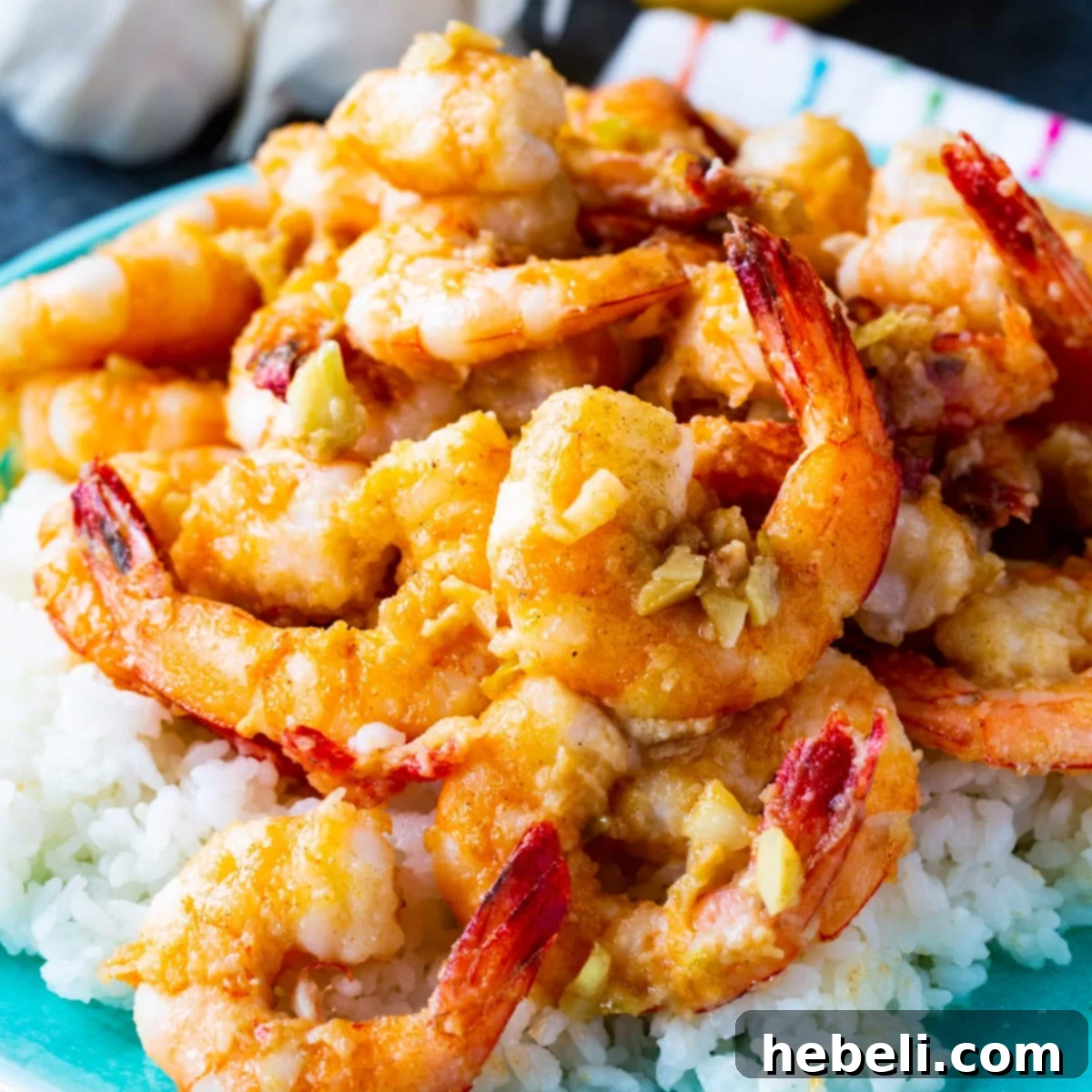 Aloha Garlic Shrimp 2 Hawaiian Garlic Shrimp served over white rice, showcasing the golden-brown shrimp and rich garlic sauce.