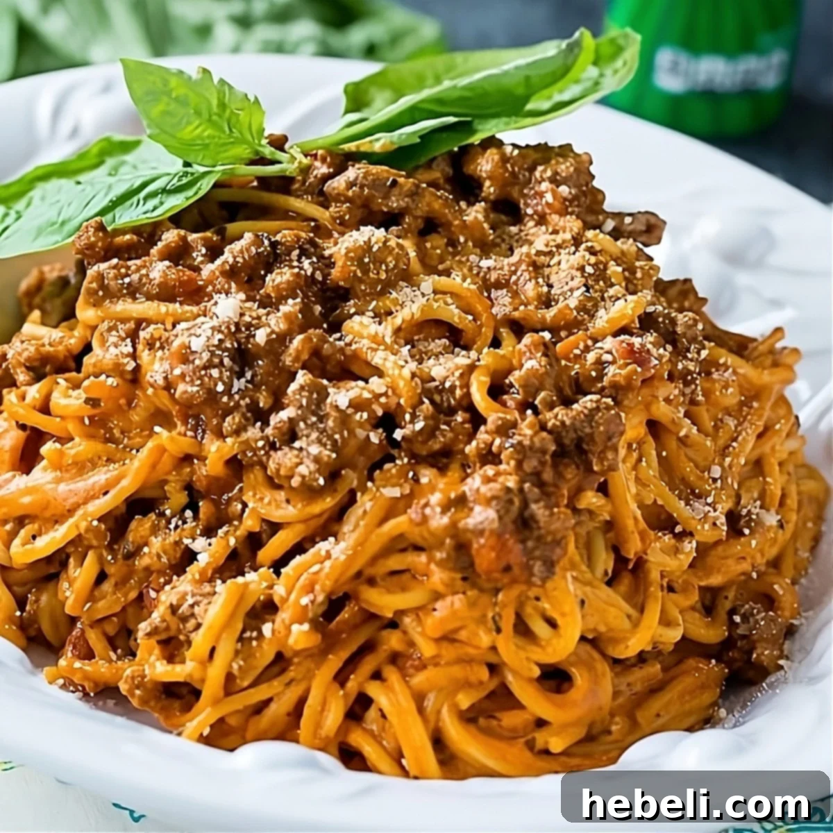 Velvety Instant Pot Cream Cheese Spaghetti 2 Instant Pot Cream Cheese Spaghetti topped with fresh basil.