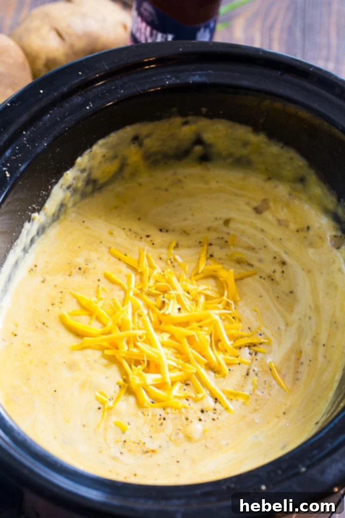 Velvety Slow Cooker Beer Cheese Potato Soup 3 Preparing uniformly diced russet potatoes for Creamy Potato Beer Cheese Soup