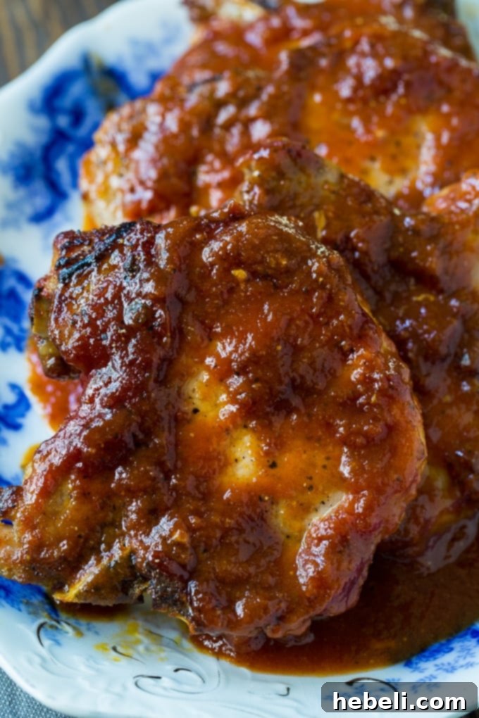 Southern Barbecued Pork Chops - Oven-baked pork chops with tangy BBQ sauce.