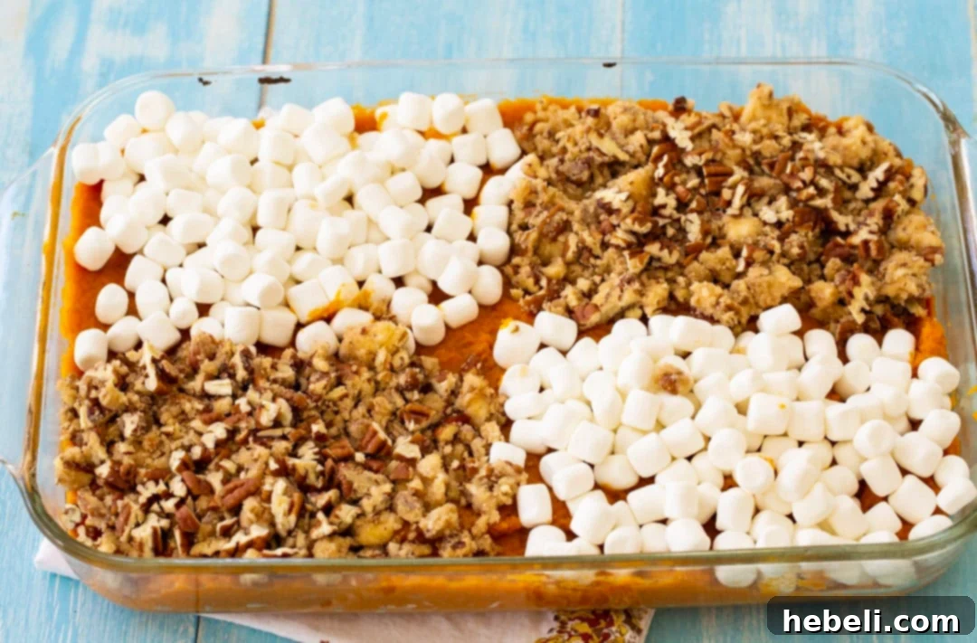 Sweet Potato Casserole with both marshmallow and pecan streusel toppings, before baking.