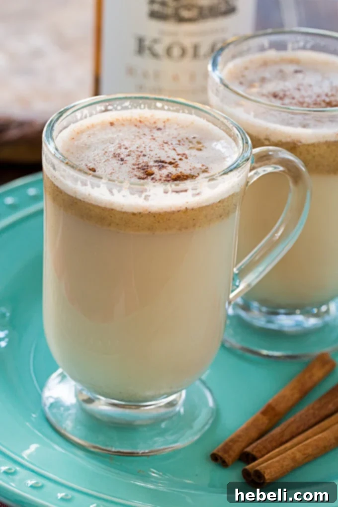 Winter's Warm Embrace 5 Ingredients for Hot Buttered Rum laid out on a table