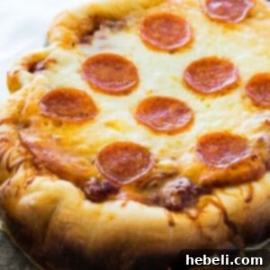 Effortless Slow Cooker Deep Dish Pizza 7 Finished Slow Cooker Deep Dish Pizza ready to be served
