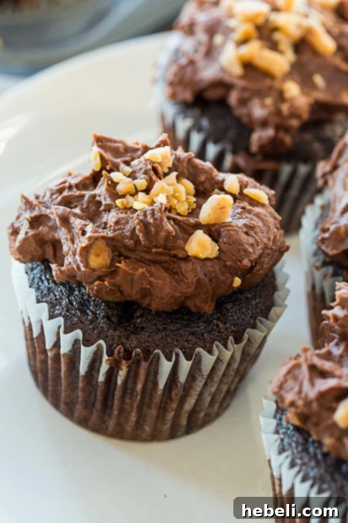 A tray of beautifully frosted Buttermilk Chocolate Cupcakes with Toffee Frosting, ready to serve