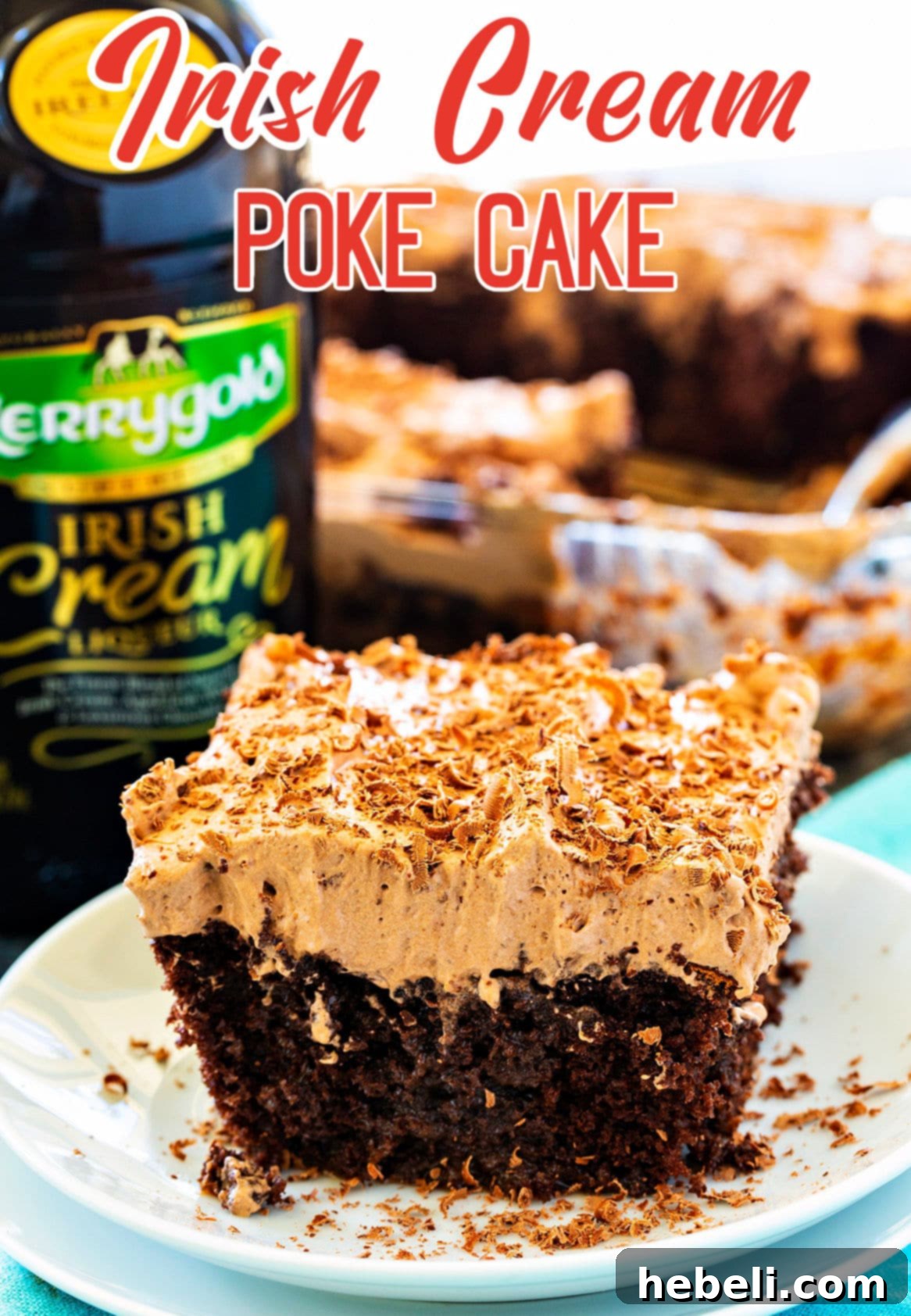 Full view of the Irish Cream Poke Cake on a plate, ready to be served.