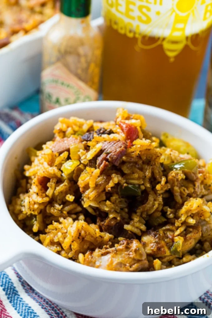 A hearty serving of Chicken and Tasso Jambalaya, ready to be enjoyed or stored as delicious leftovers.