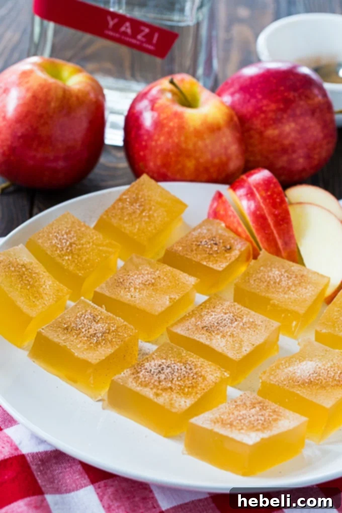 Crisp Apple Gelatin Shooters 3 Apple Cider Jello Shots being poured into a baking pan