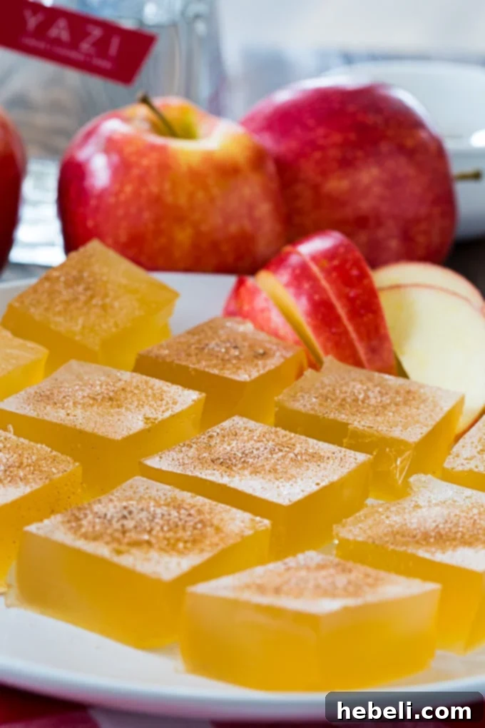 Crisp Apple Gelatin Shooters 4 Apple Cider Jello Shots cut into squares and served on a platter