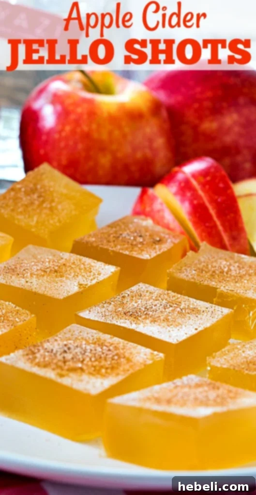 Crisp Apple Gelatin Shooters 6 Close-up of Apple Cider Jello Shots garnished with cinnamon sugar