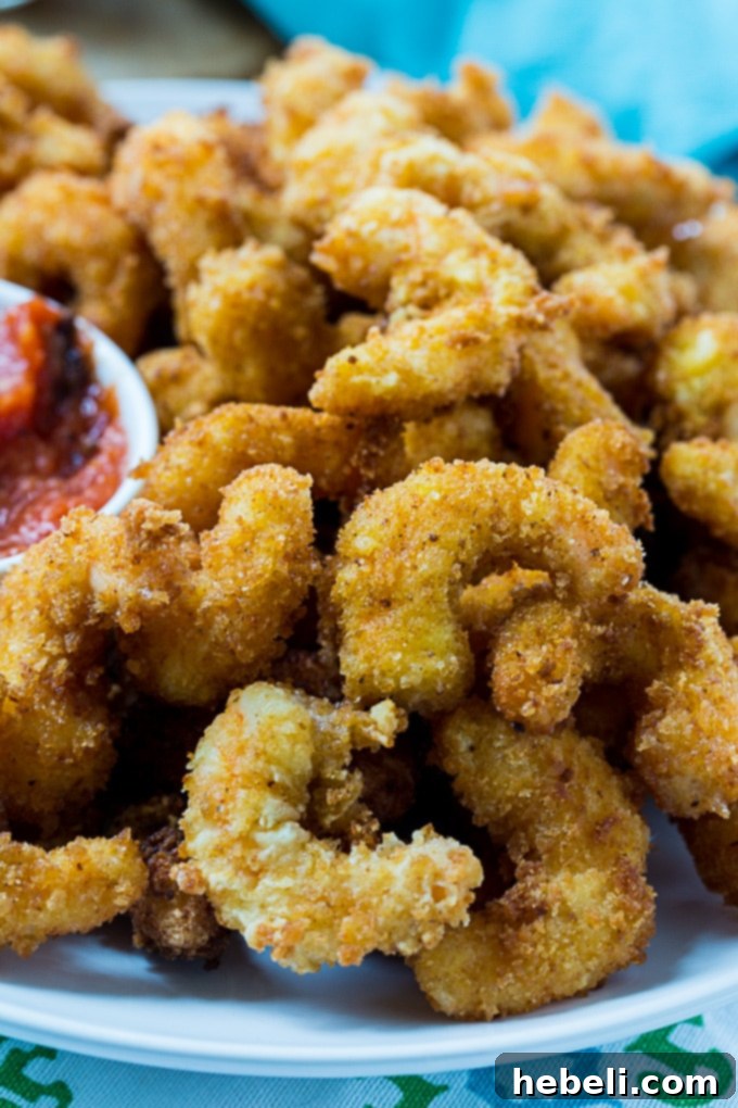 Crispy Fried Shrimp served with cocktail sauce and lemon
