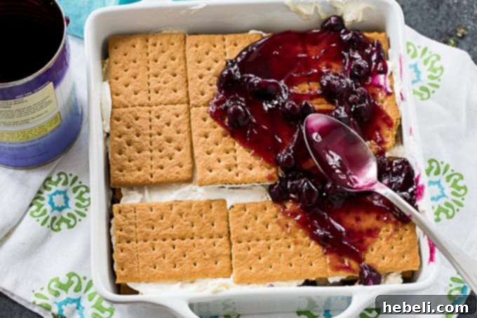 Blueberry Cheesecake Icebox Delight 5 Blueberry Cheesecake Icebox Cake with creamy top layer