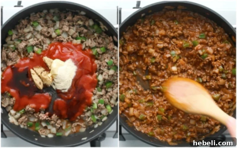 Sloppy Joe mixture simmering in a skillet, appearing rich and aromatic.