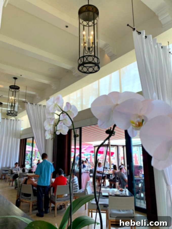 The Royal Hawaiian Restaurant interior showing stylish decor, comfortable seating, and an inviting ambiance