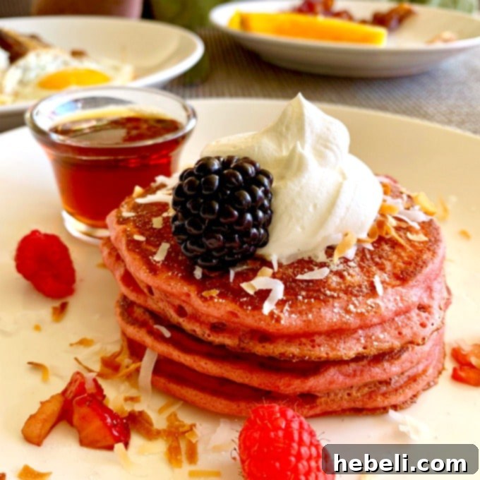 Close-up of the famous Signature Pink Pancakes served at The Royal Hawaiian, beautifully presented