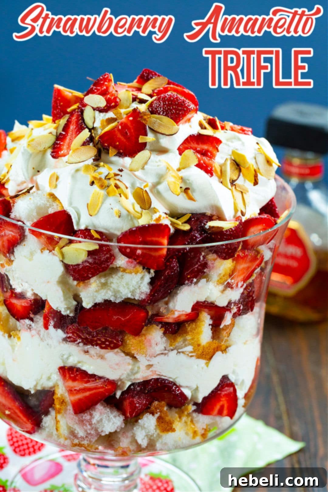 Velvet Amaretto Strawberry Trifle 6 Another beautiful shot of the Strawberry Amaretto Trifle in its elegant glass dish, perfectly garnished and ready for a spring or summer gathering.