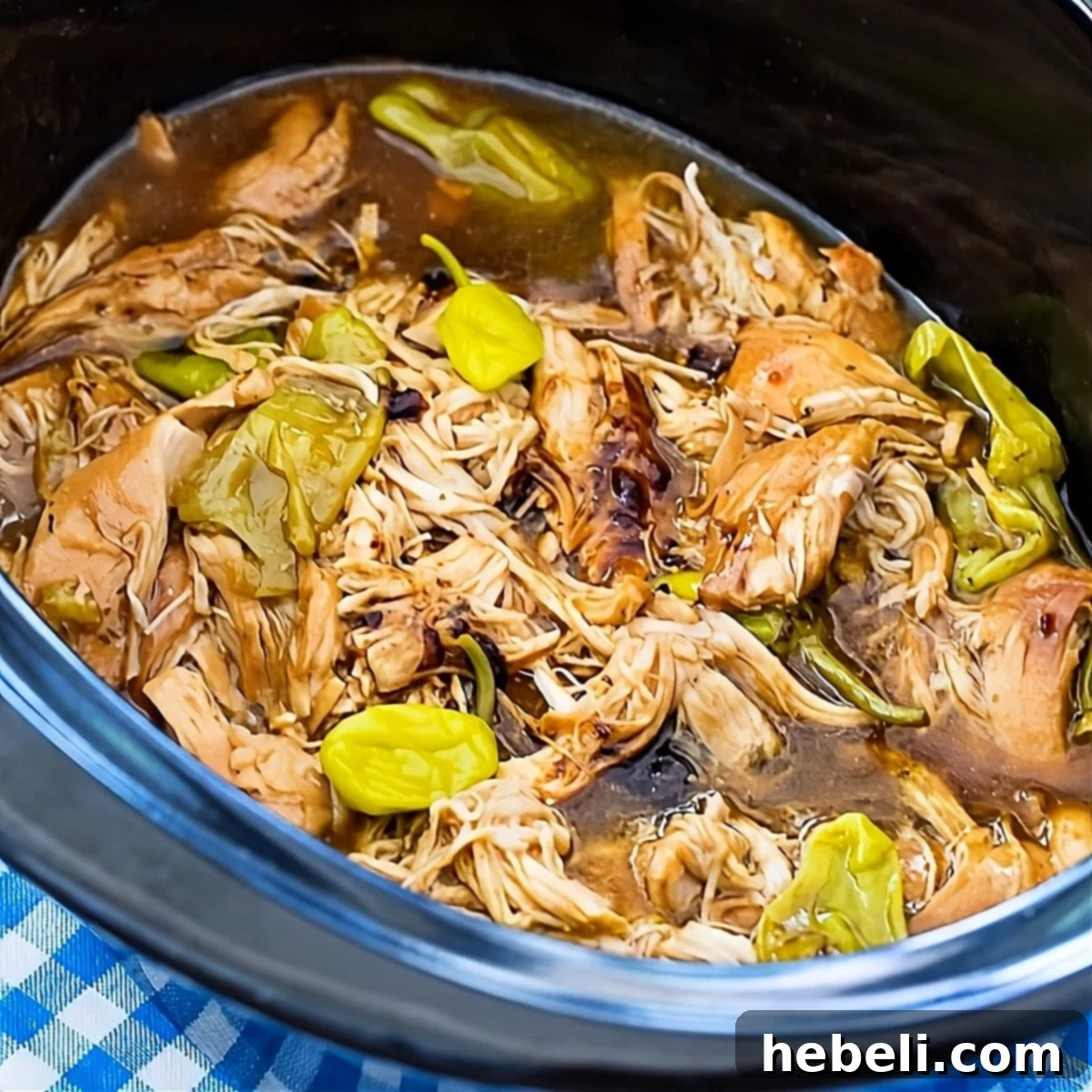 Mississippi Chicken in a slow cooker, a popular easy meal.