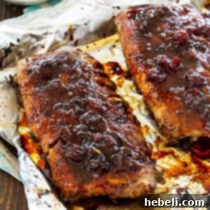 Cheerwine ribs on baking sheet.