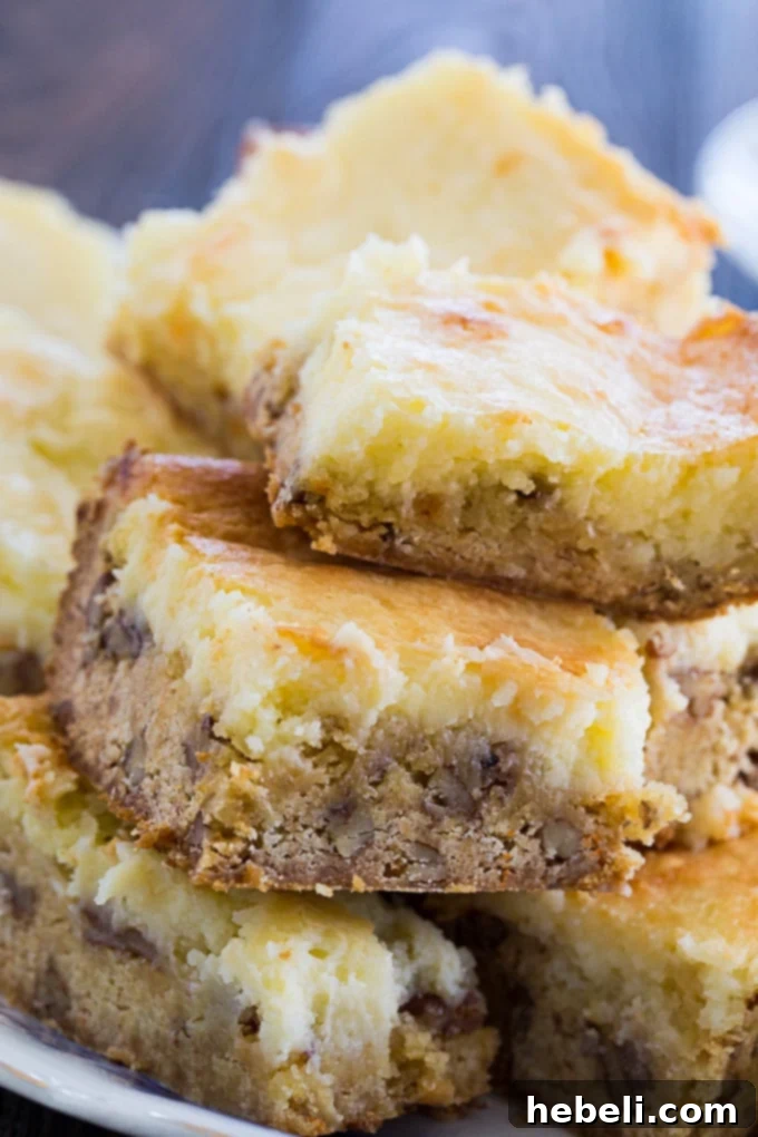 Southern Comfort Chess Squares 3 Southern Chess Squares cooling in a 9x13-inch baking pan after coming out of the oven