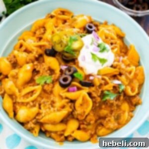 Bowl full of Instant Pot Cheesy Taco Pasta.
