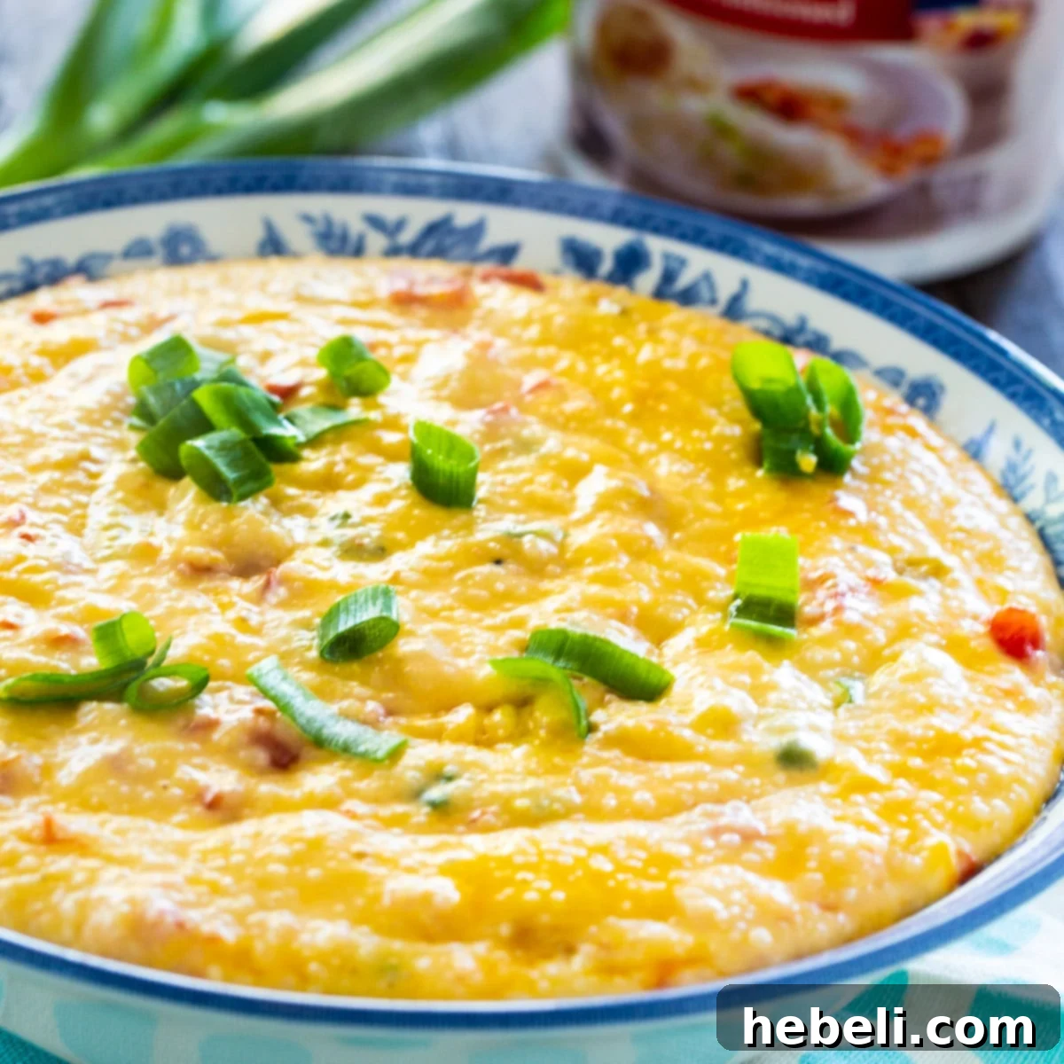 Creamy Tomato Cheese Grits 2 A beautifully presented bowl of Cheesy Tomato Grits, ready to be enjoyed.