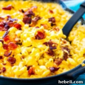 Bourbon and Bacon Mac and Cheese in a cast iron pan.