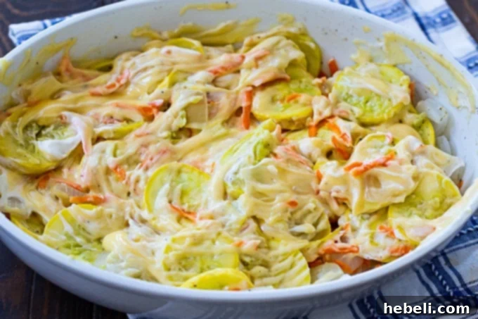 Stuffing-Topped Squash Casserole 4 Sliced squash and chopped onions ready in a casserole dish before baking.