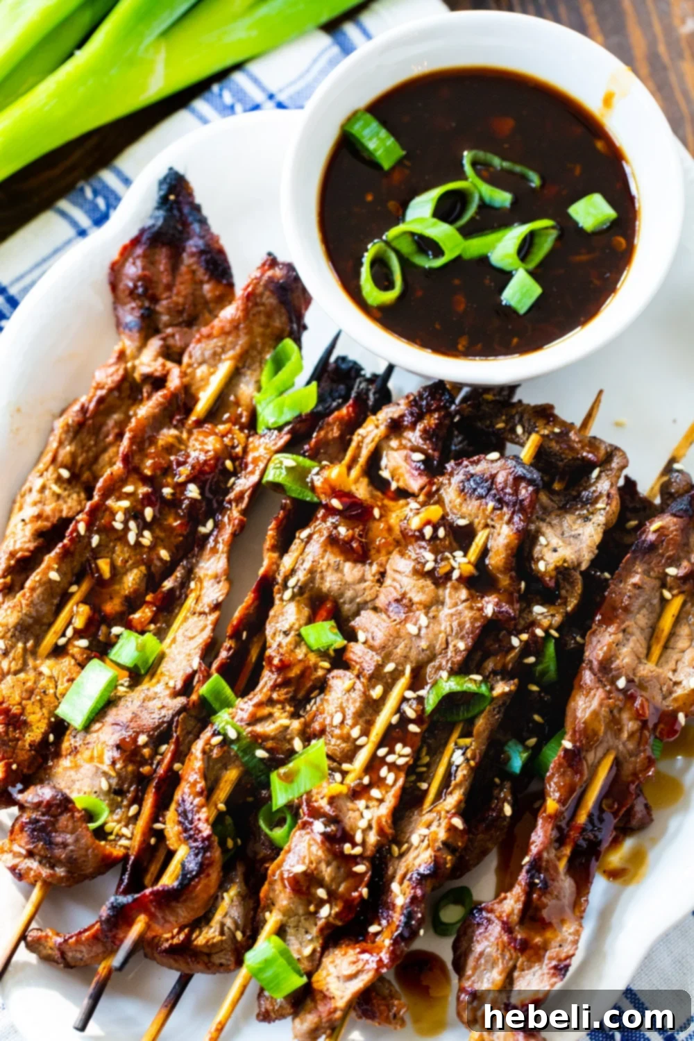 Marinated Steak Skewers with Korean BBQ Sauce arranged beautifully on a serving platter, ready to be enjoyed.