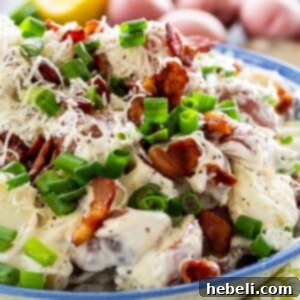 Caesar Potato Salad recipe card image, a top-down view of the creamy salad