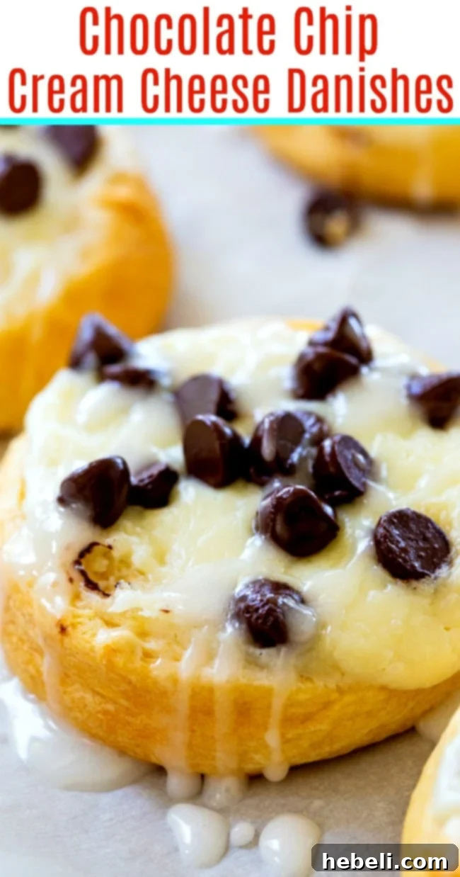An appetizing overhead shot of several Chocolate Chip Cream Cheese Danishes, perfectly baked and glazed, ready to be served.