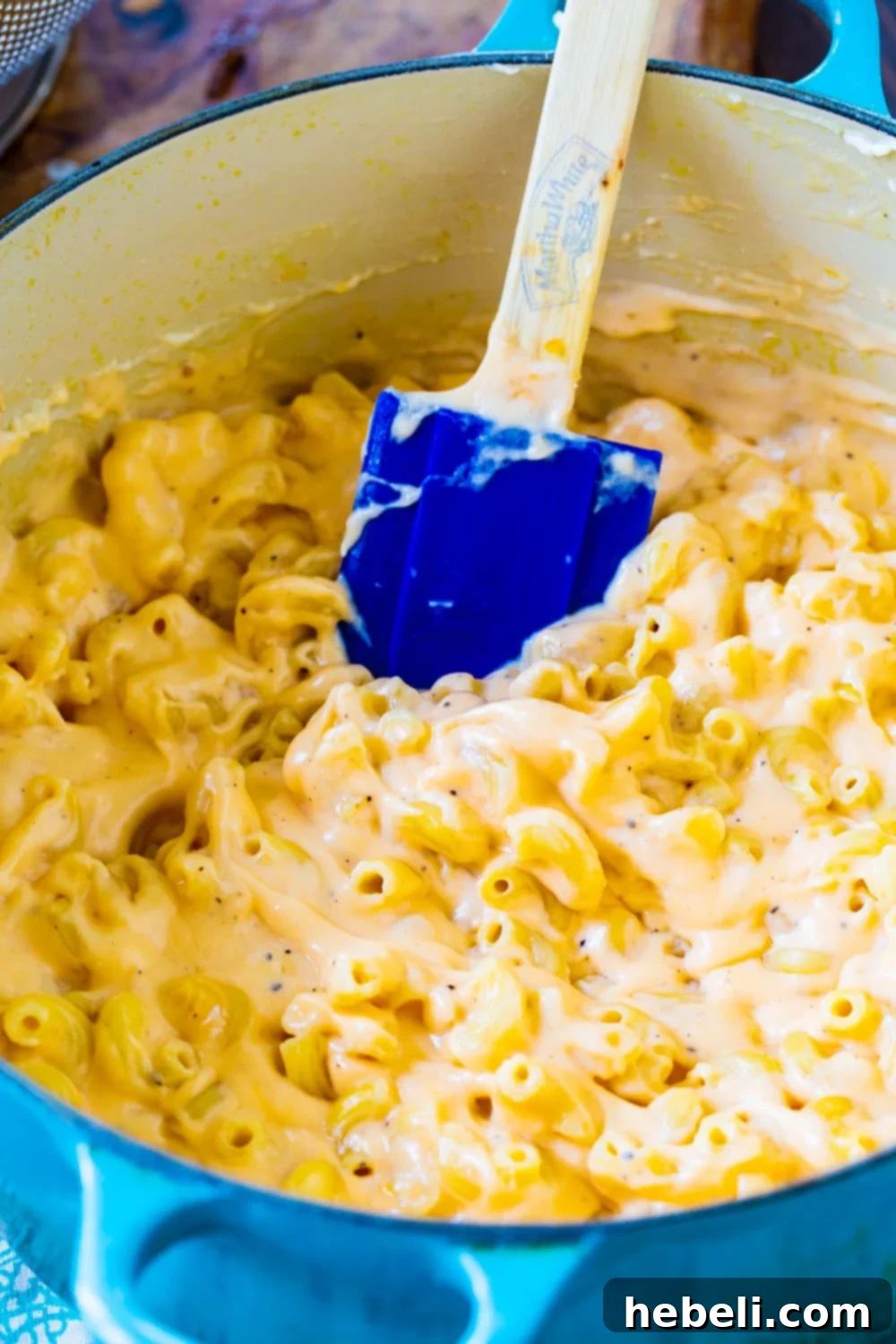 Velvet Mac and Cheese 3 Creamy Mac and Cheese cooking in a large blue Dutch oven.