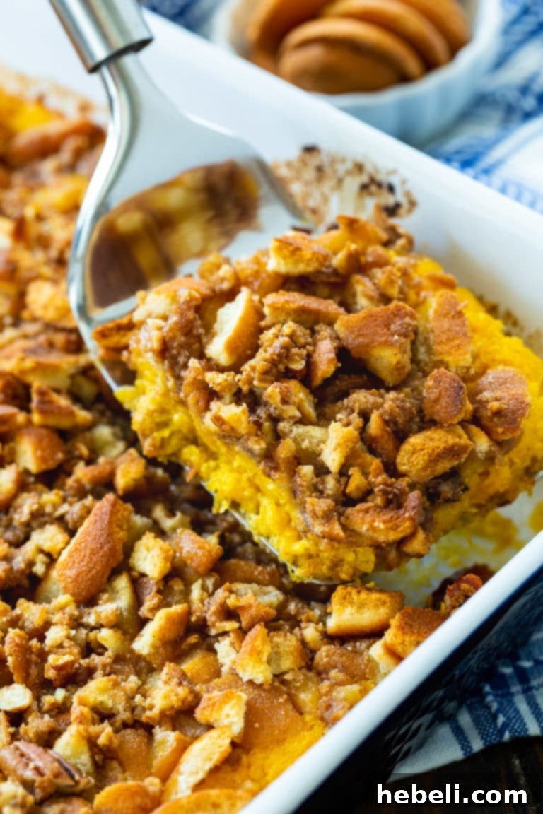 A generous portion of Butternut Squash Casserole, presented as a perfect Thanksgiving side dish.